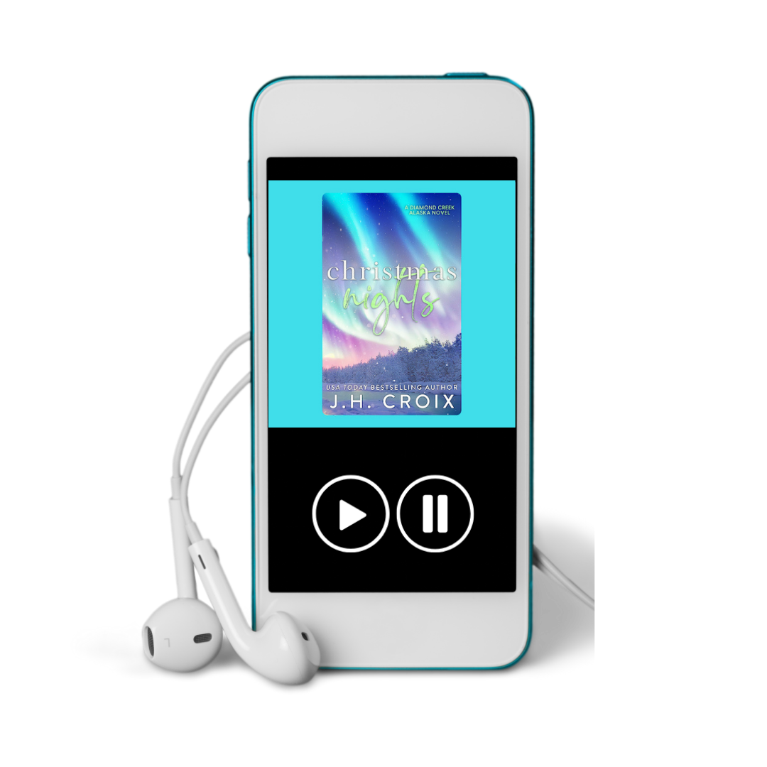 Blue digital media player with earphones displaying 'Christmas Nights' by J.H. Croix.