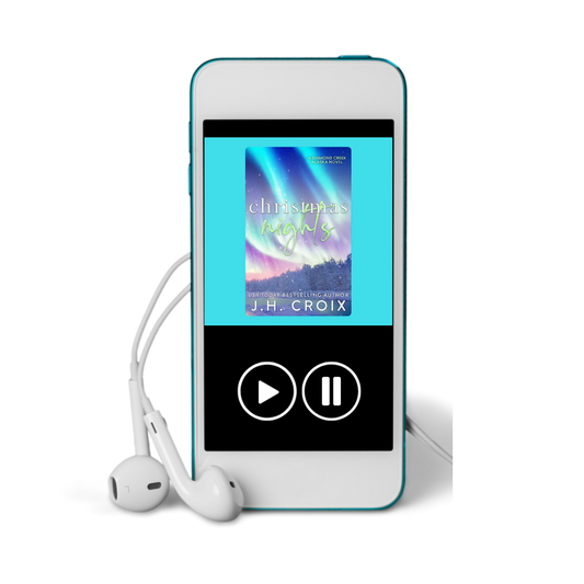 Blue digital media player with earphones displaying 'Christmas Nights' by J.H. Croix.